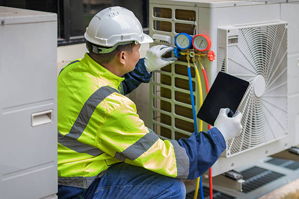 Professional Emergency Hvac Repair technician working in Helmetta, NJ
